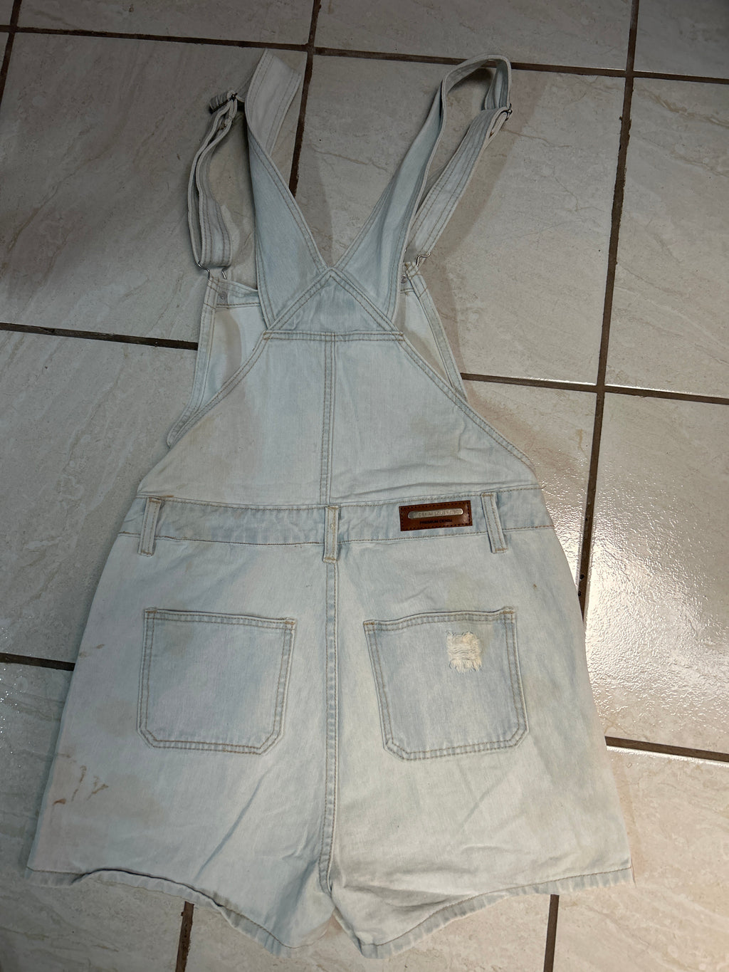 Overall corto
